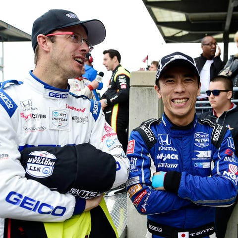 Sebastien Bourdais, left, and Takuma Sato had a...