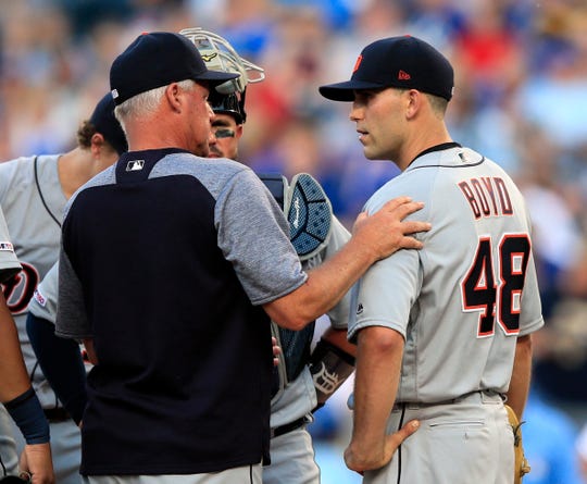 Detroit Tigers starting pitcher Matthew Boyd (48) meets with pitching coach Rick Anderson during the fifth inning.