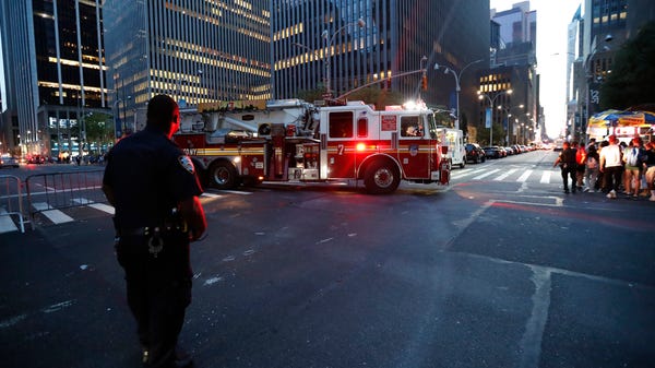 Fire trucks respond during a widespread power...
