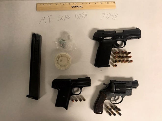 Three guns were recovered when police approached individuals they believe are connected to a recent music video.