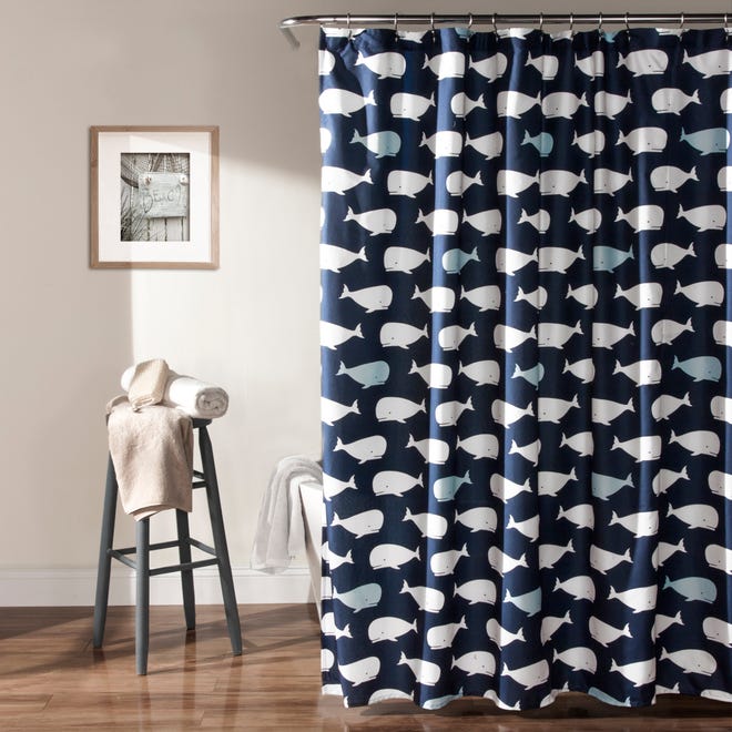 A shower curtain with a beachy feel can make your space reminiscent of an outdoor setting.