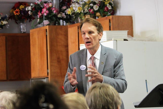Republican Congressional candidate Chris Mathys answers a heckler during a town hall meeting at the Rio Mimbres Baptist Church in Mimbres on Saturday, July 13, 2019.