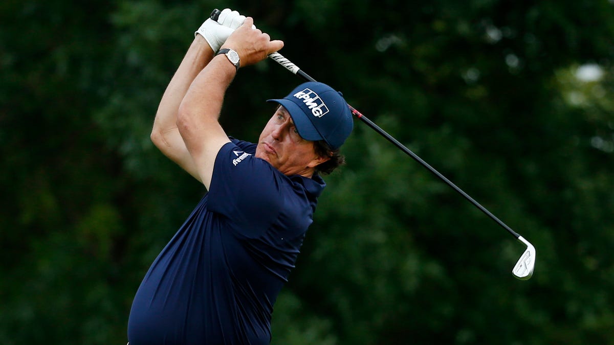 Jul 4, 2019; Blaine, MN, USA; Phil Mickelson tees off the at the 1st hole during the 10th round of the 3M Championship golf tournament at TPC Twin Cities. Mandatory Credit: Bruce Kluckhohn-USA TODAY Sports ORG XMIT: USATSI-389831 ORIG FILE ID:  20190704_pjc_sk1_001.JPG