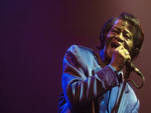 (FILES)Legendary US singer, the "Godfather of Soul," James Brown performs on the stage during his ''Seven decades of funk tour'' at the T-Mobile arena in Prague 04 November 2006. Brown, who died 25 December, 2006, finally was laid to rest 10 March, 2007, according to a statement by Reverend Al Sharpton. AFP PHOTO/FILES (Photo credit should read MICHAL CIZEK/AFP/Getty Images) ORG XMIT: CON03