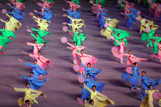 North Koreans perform during a mass game performance of "The Land of the People" at the May Day Stadium in Pyongyang, North Korea on July 16, 2019.