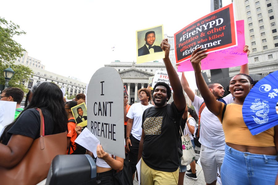 People participate in a protest July 17 to mark the five-year anniversary of the death of Eric Garner in New York.