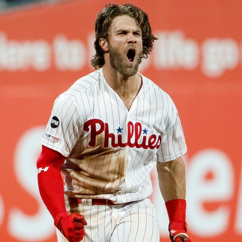 Philadelphia Phillies' Bryce Harper celebrates...