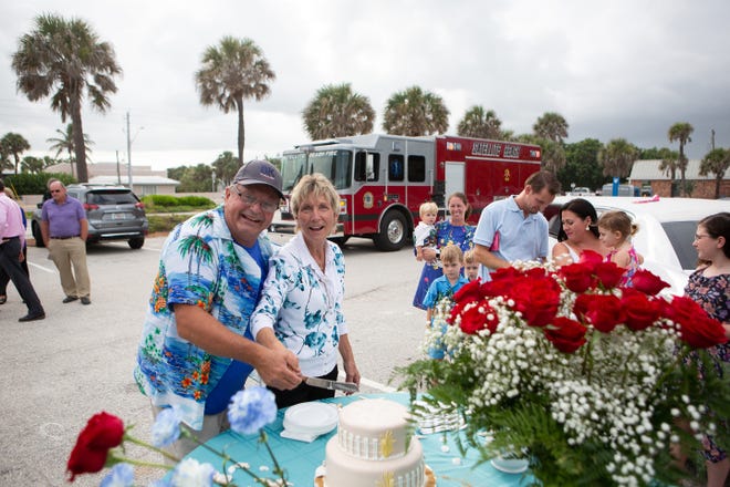 Cindy and Pete Rogell cut a cake at their 40th anniversary party at Pelican Beach Park -- a surprise party Pete planned down to having Cindy, bakery manager at Publix in Viera, arrive thinking she was delivering a cake for a wedding at the beach.
