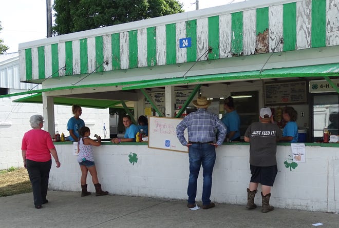 Fairgoers place their orders at the 4-H food stand during the 2019 Crawford County Fair. Plans are being developed for construction of a multi-use building at the Crawford County Fairgrounds that would include a new food stand.