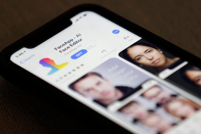 FaceApp is displayed on an iPhone Wednesday, July 17, 2019, in New York. The popular app is under fire for privacy concerns.