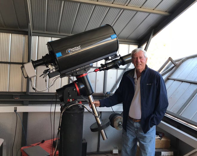 Ted Wolfe is pictured with his latest telescope set-up in Chile.
