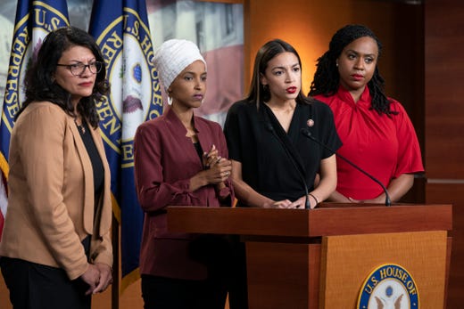From left, Rep. Rashida Tlaib, D-Mich., Rep. Ilhan Omar, D-Minn., Rep. Alexandria Ocasio-Cortez, D-N.Y., and Rep. Ayanna Pressley, D-Mass., respond to remarks by President Donald Trump after his call for the four Democratic congresswomen to go back to their "broken" countries, during a news conference at the Capitol in Washington, July 15, 2019. All are American citizens and three of the four were born in the U.S.