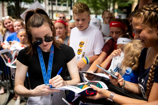 Rose Lavelle signs autographs for hundreds of fans on Fountain Square in downtown Cincinnati Friday, July 19, 2019. 
