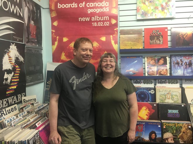 Carl Hultgren and Windy Weber are the owners of Stormy Records in Dearborn, which is celebrating their 20th anniversary Saturday.