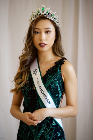 Kathy Zhu, 20, accepting her Miss Michigan Crown on Sunday, July 14.