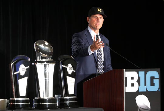 Michigan coach Jim Harbaugh responds to a question during the Big Ten media days on Friday, July 19, 2019, in Chicago.
