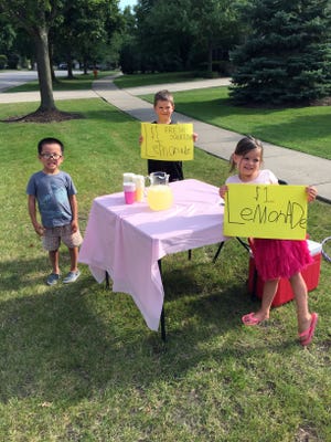 When you're 7, 5 and 4, running a lemonade stand is chock-full of lessons, from marketing to customer service to math.