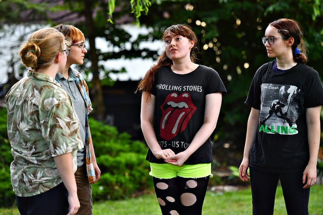 From left, Theseus (Meredith Singleton), Demetrius (Paige Gross), Hermia (Michaela Wagner) and Lysander (Abbey Hardman) as Upstart Arts rehearses A Midsummer Night's Dream in West Manchester Township, Thursday, July 18, 2019. The outdoor performances will be at area parks July 19-28, with the first at Gifford Pinchot State Park. Dawn J. Sagert photo