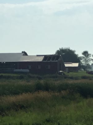 An EF-0 tornado damaged the roof of a barn southwest of Crooks on Thursday.