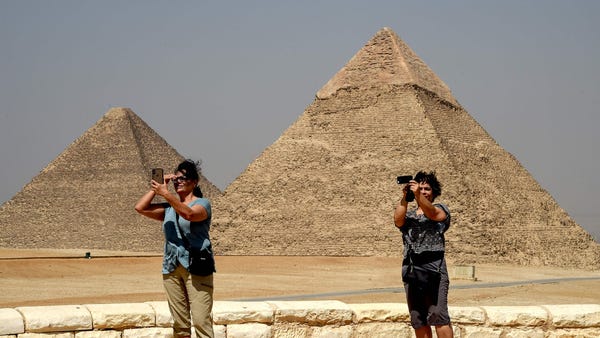 7. Pyramids of Giza — Cairo, Egypt  Estimated...