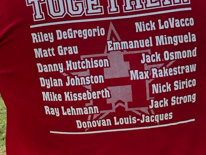 A fan of the Holbrook 12-year-old All-Stars wears a t-shirt showing the members of the team on July 20 at Toms River East Little League. Holbrook defeated Bordentown, 6-4, in the Section 3 Championship game.