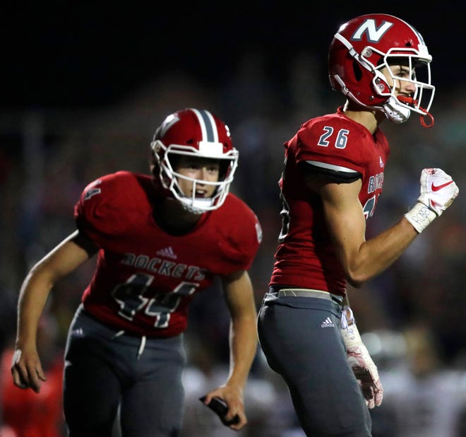 Neenah's Jack Van Dyke celebrates after converting an extra point against Appleton North on Aug. 24, 2018. Van Dyke recently committed to play at Wisconsin as a preferred walk-on. Danny Damiani/USA TODAY NETWORK-Wisconsin.