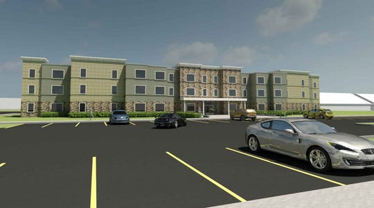 A rendering of the new affordable housing development planned at the site of Erie Homes, which was razed in 2008 at Lincoln Avenue and Southeast Tenth Street.