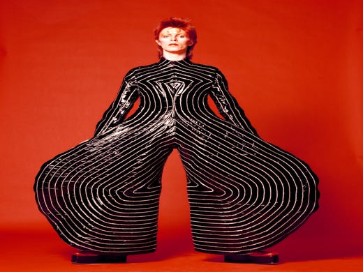 David Bowie wears the 'Tokyo Pop' bodysuit designed by Kansai Yamamoto for the "Aladdin Sane" tour, 1973. HANDOUT Photo by Masayoshi Sukita, The David Bowie Archive [Via MerlinFTP Drop]