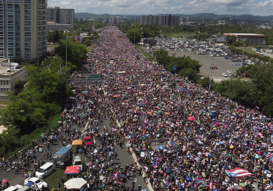 Thousands of people fill the Expreso Las Américas highway, calling for the ouster of Gov. Ricardo Rosselló on July 22 in San Juan, Puerto Rico.