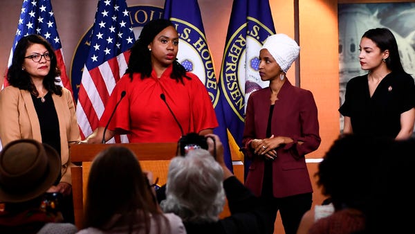 Reps. Ayanna Pressley, D-Mass., speaks as, Ilhan...