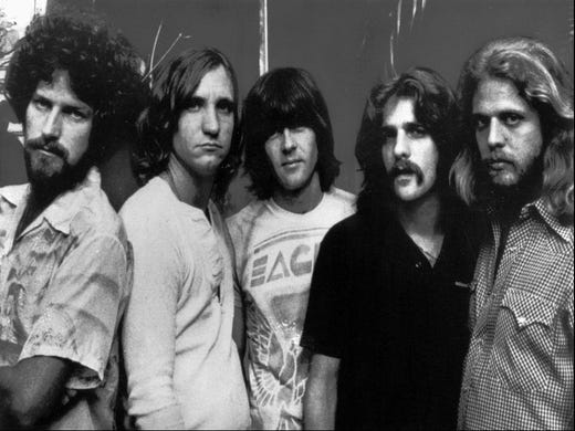 FILE--The Eagles, shown in a 1977 file photo, one of the most popular and influential rock bands of the 1970s, will launch a world reunion tour this summer. Group members, from left are, Don Henley, Joe Walsh, Randy Meisner, Glenn Frey and Don Felder. Timothy B. Schmit will replace Randy Meisner on the tour. The Tour will start May 27 at the Irvine Meadows Amphitheater, tour organizers said. (AP Photo) ORG XMIT: NY14
