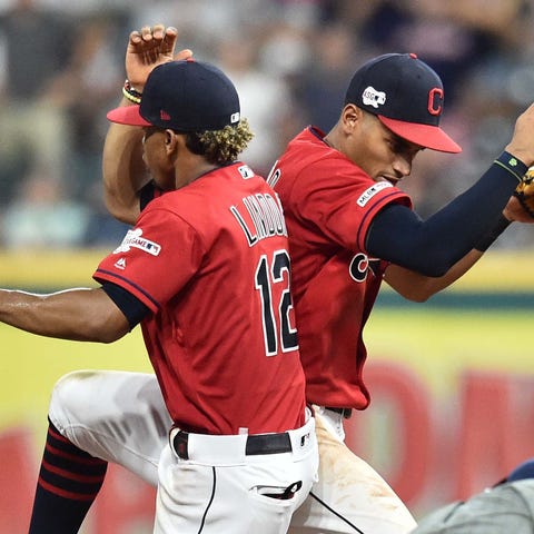 Indians' Francisco Lindor and Oscar Mercado...