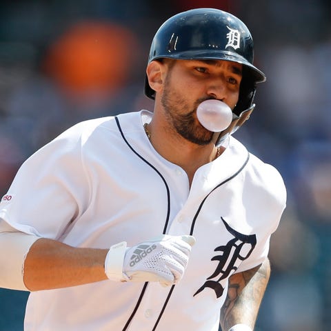 Castellanos rounds the bases after hitting his...