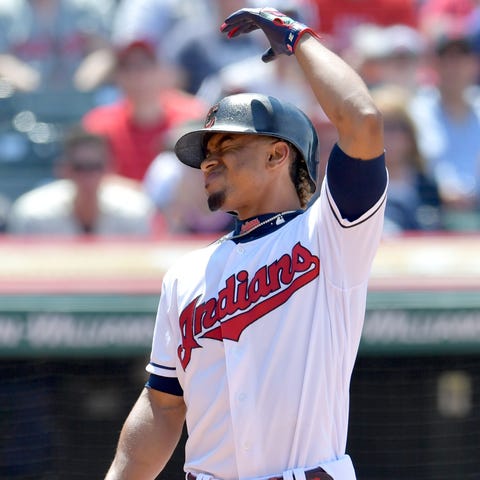The Indians' Francisco Lindor reacts after a foul...