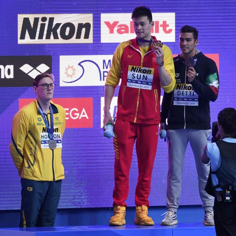 Australia's Mack Horton (left, silver medalist)...