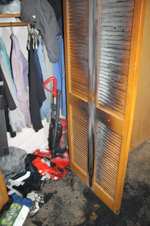 This closet door in a West Allis apartment caught fire after a bag of hot laundry was left a lone to smolder and ignite, according to the West Allis Fire Department.