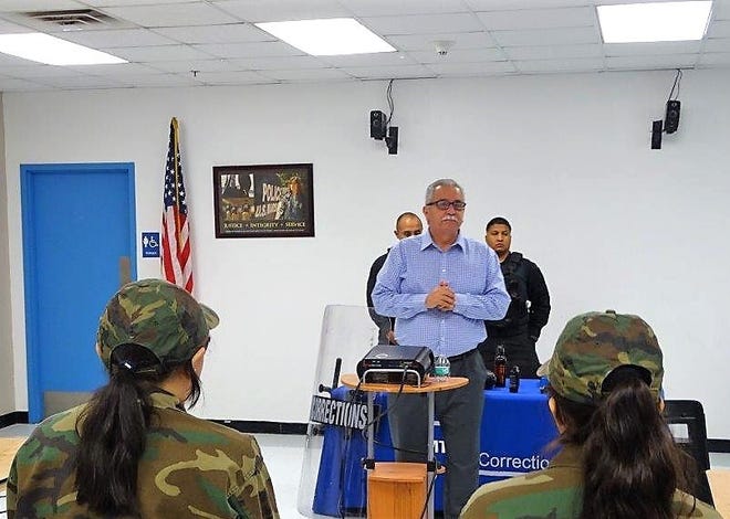 Otero County Prison Facility Warden Rick Martinez talks to Santa Teresa High School students July 19.