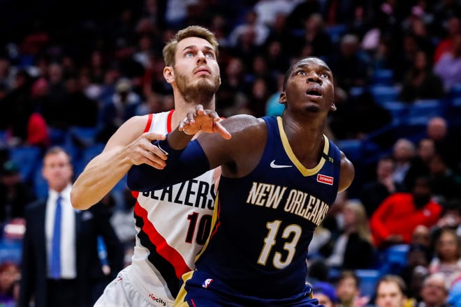 Pelicans forward Cheick Diallo boxes out Trail Blazers forward Jake Layman during a game at Smoothie King Center.
