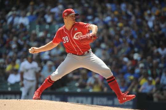Jul 24, 2019; Milwaukee, WI, USA; Cincinnati Reds starting pitcher Lucas Sims (39) delivers a pitch against the Milwaukee Brewers at Miller Park. Mandatory Credit: Michael McLoone-USA TODAY Sports