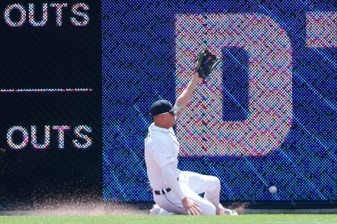 Tigers center fielder JaCoby Jones can't reach a fly ball hit by Phillies' Rhys Hoskins in the first inning of Wednesday's 4-0 loss.