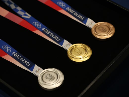 The three medals that will be awarded at the 2020 Summer Olympics.