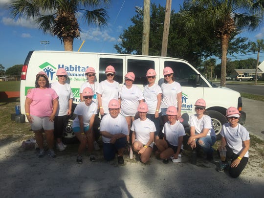 Team CRI members Joyce Ruggeri, Jamie Dunham, Karla George, April Hicks, Christy Anglim, Clarice Rieth, Kathy Miller, Cynthia Wilson, Stephanie Murray, Barbara Barbero, Danae Silver, Anita Brock, Morgan Murphy volunteer at the Martin County Habitat Women Build Day.