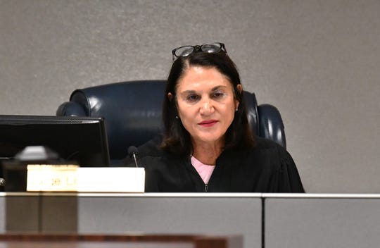 At a guardian hearing in Judge Lisa Davidson's courtroom at the Moore Justice Center in Viera, guardian Manda Wright replaced Rebecca Fierle for two Brevard residents as their guardian. Judge Lisa Davidson at the hearing. 