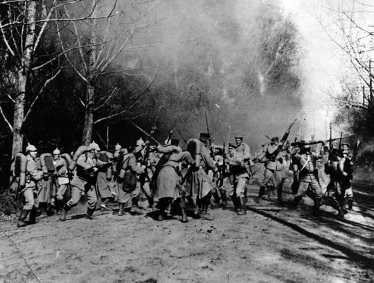 One a day in mid-September, 1914, near Berry-au-bae, in France, a German scouting party stumbled on a French outpost in a clearing near the Argonne forest. The resulting scene produced one of the best action photographs of the first World War and it got through to the United States without censorship action.