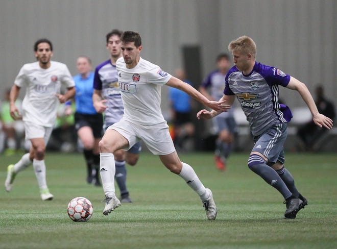 Midfielder Steven Juncaj of the Michigan Stars in action against the Kalamazoo FC this season.