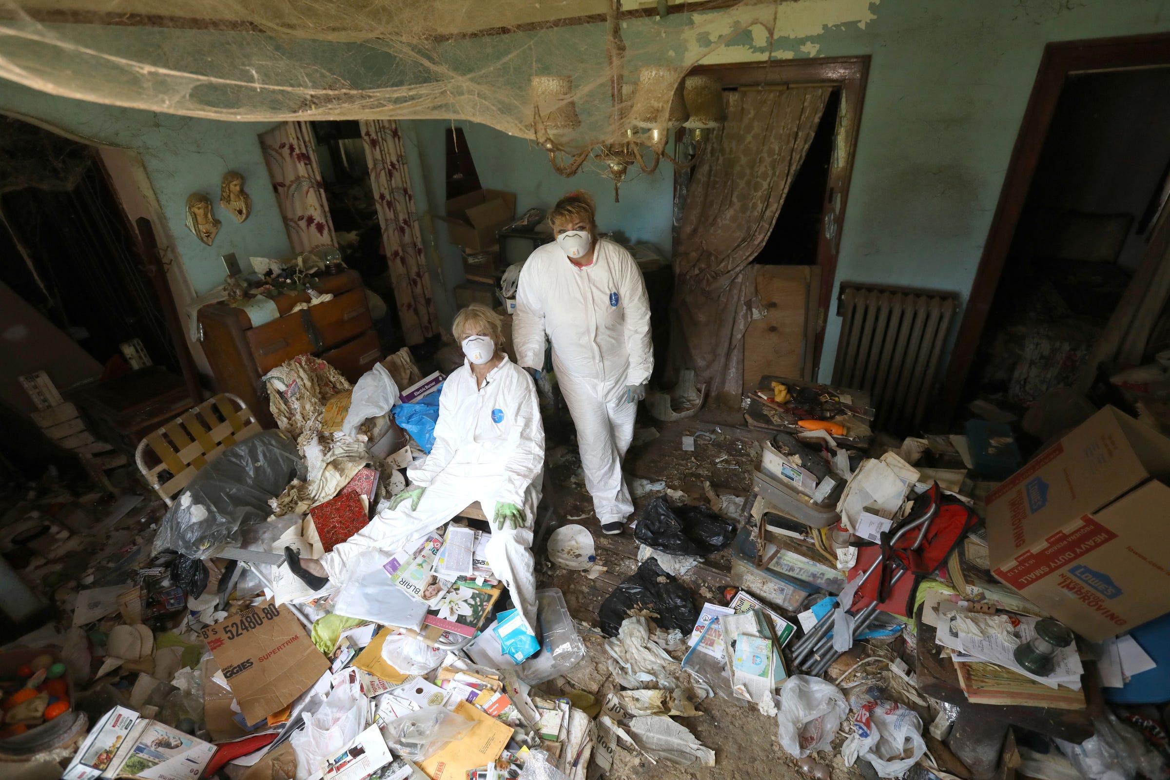 Image result for cleaning up hoarder house