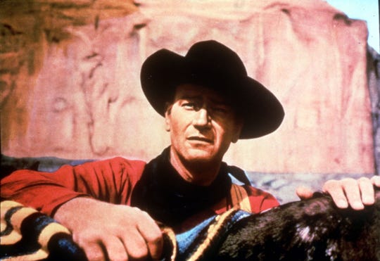 John Wayne in a scene from Warner Brothers' "The Searchers."