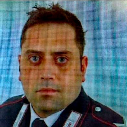 In this photo released by Carabinieri, is...