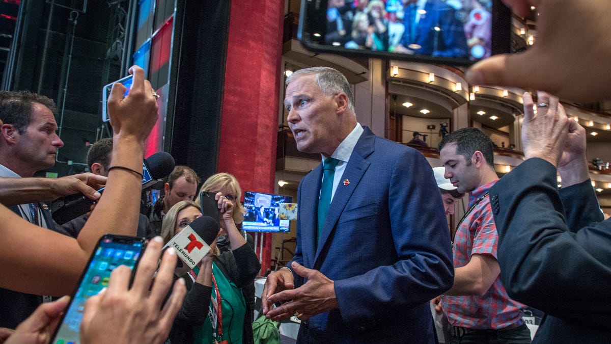 Washington state Gov. Jay Inslee, who seeks the Democratic nomination for president in 2020, speaks to the media in the Adrienne Arsht Center of the Performing Arts, where the first Democratic presidential primary debate was held in Miami, Florida, in June.