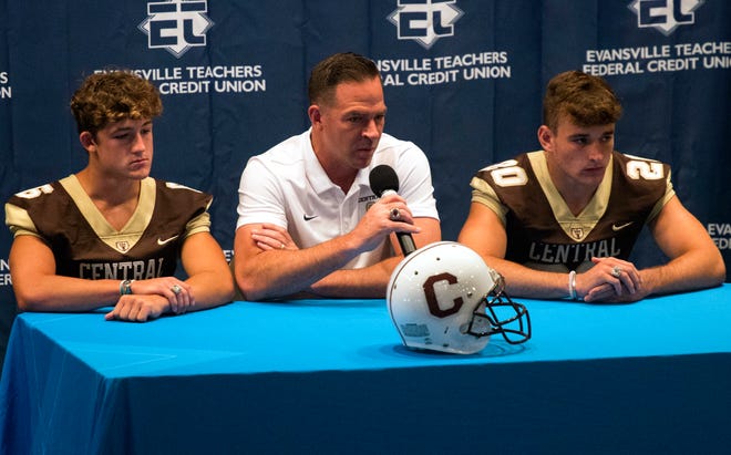 Central's Head Coach Sean Coultis, center, answer questions with Camdyn Counts, left, and Jacob Boberg, right, during High School Football Media Day 2019 Monday, July 29, 2019. 